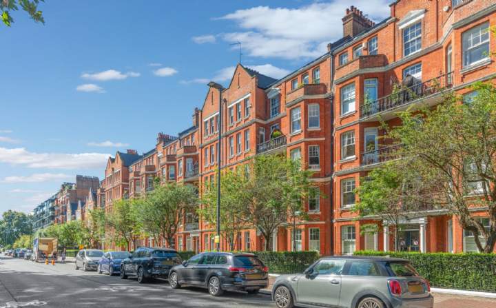 Red-brick London apartment building illustrating flat service charges and communal maintenance
